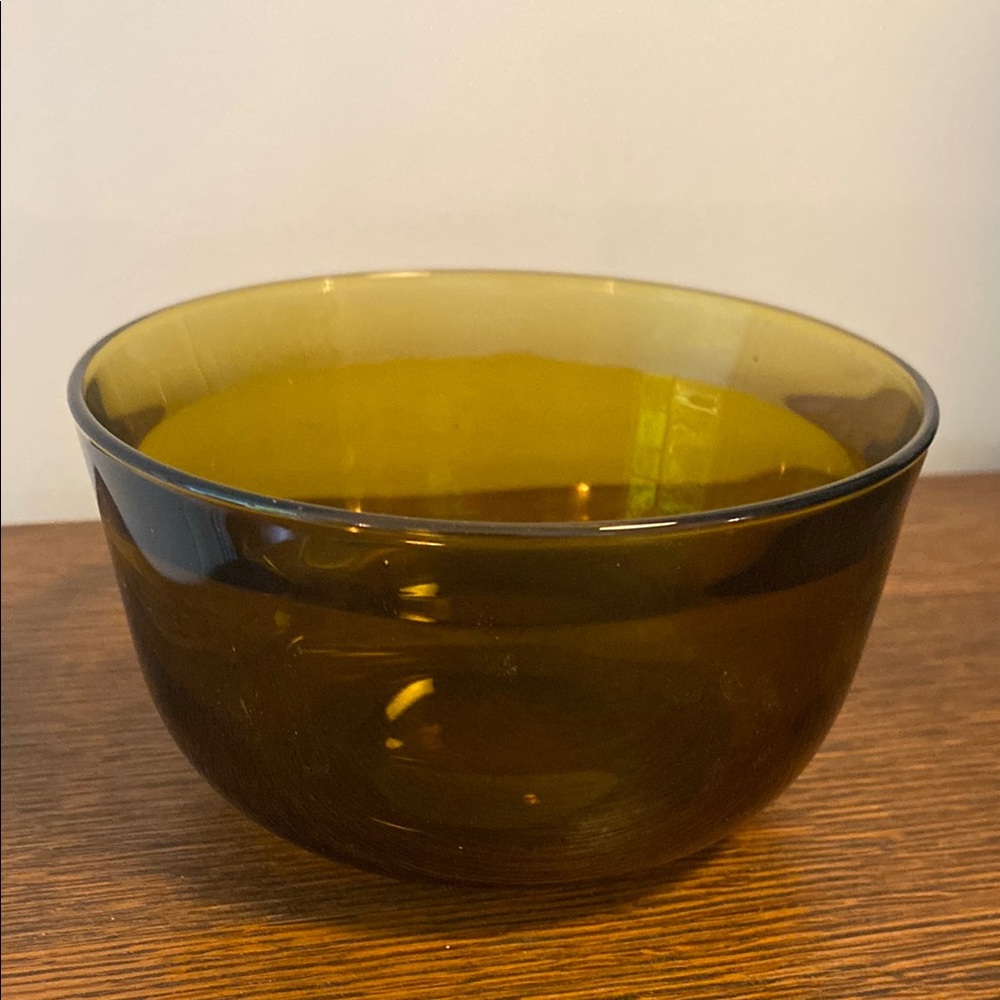 Nuutajärvi Fasetti 1974 bowl in amber color, designed by Kaj Franck.